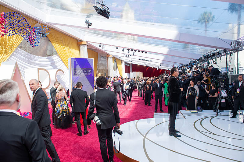 Press on the red carpet at the Oscars in Los Angeles, California